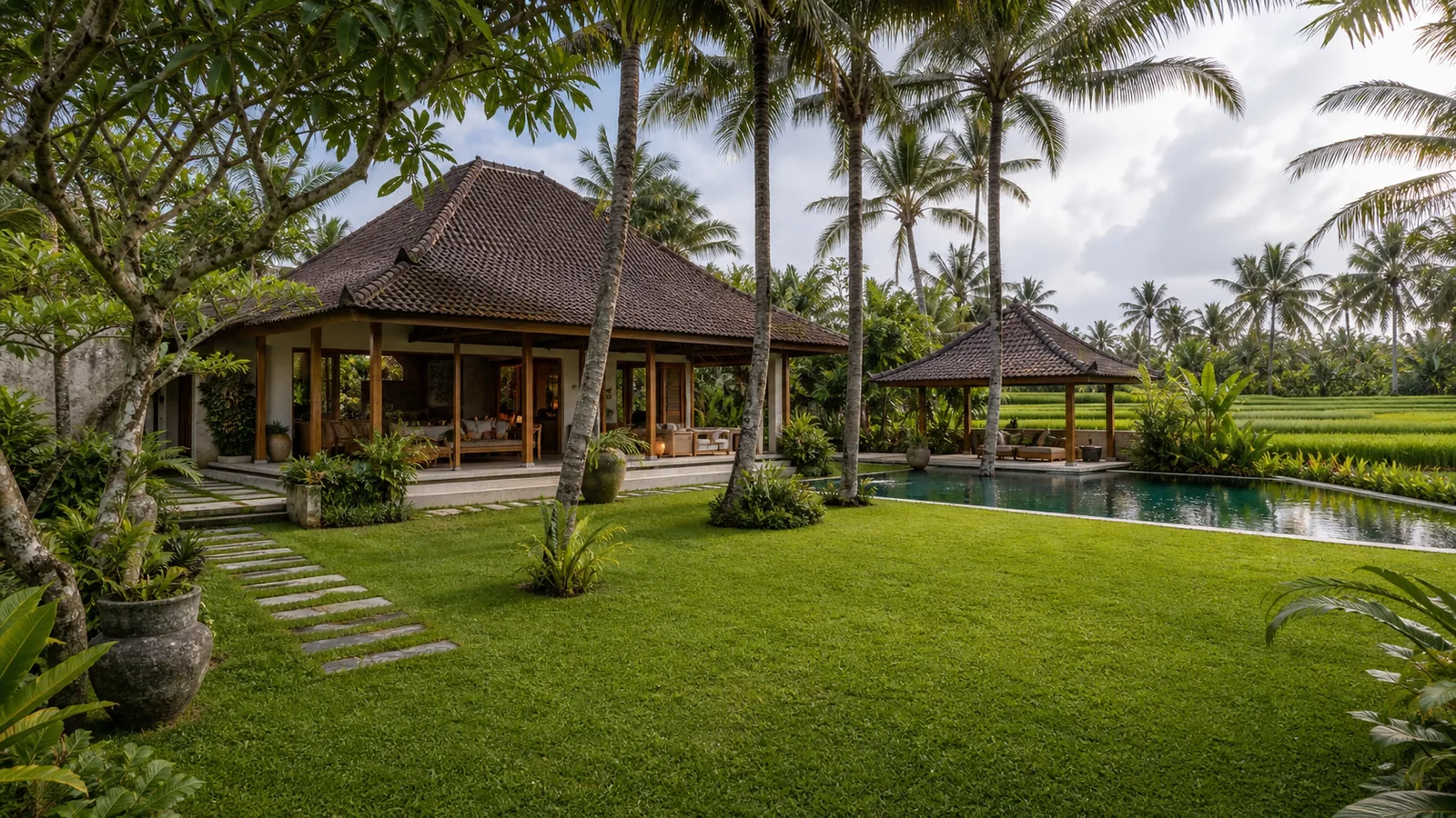 Tabanan larger villa estate with broad lawn and long swimming pool