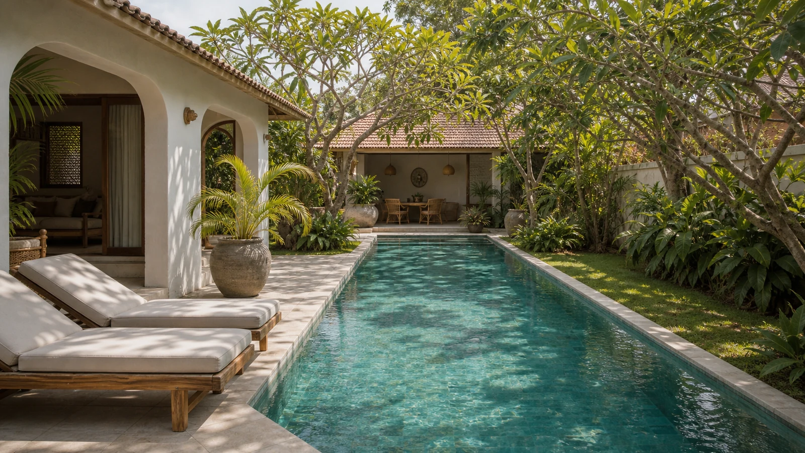 Sanur Bali villa location feel: pool edge composition that expresses the selected Bali location through planting, horizon, or courtyard density.
